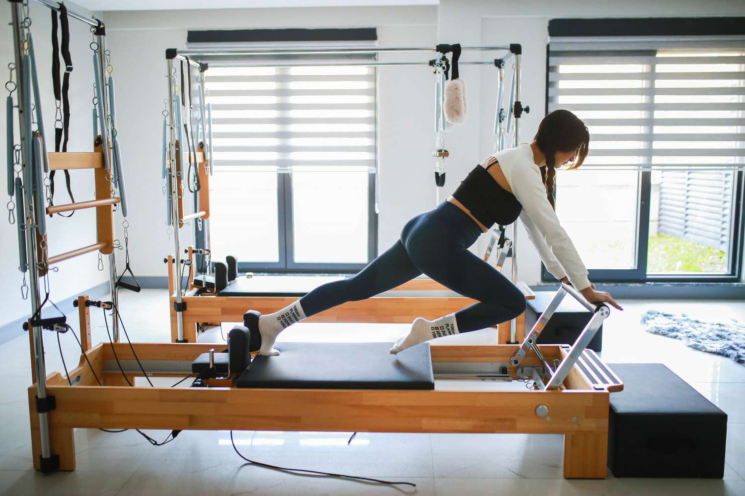 How athletes can increase their flexibility, strength, and endurance with reformer Pilates